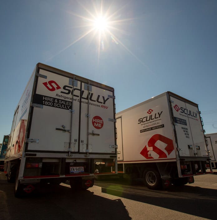Scully trucks with ray of sunlight